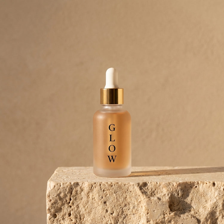 Sérum Éclat Vitamine C GLOW : packshot sur travertin